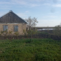Типичный дом для сел которые образовали переселенцы из зоны затопления ДНЕПРОГЭСА.
