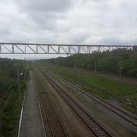 Вид на запад с переходного моста станции Орловщина.