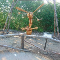 На территории исторического парка "Бастион". Выставка деревянных скульптур "Тайная жизнь насекомых". Комар гигантский