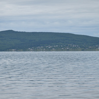 Вид на Большие Санники с противоположного берега озера.