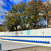 На территории СОСЛ МЭИ "Алушта". Футбольное поле с трибунами.