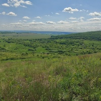 Вид на село Вишневое и гору Медвежью от урочища Гузиков лес