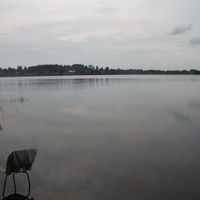 Вид через озеро Каркомля на Ивановское