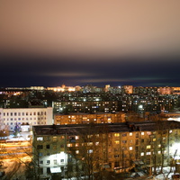Вечерний город с высотки на Терешковой