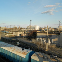 Переходной мост над территорией тепловозоремонтного завода с ул.Краснозаводской к железнодорожному вокзалу.Вид на станцию Днепропетровск-Главный.