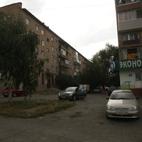 По улице Короленко.