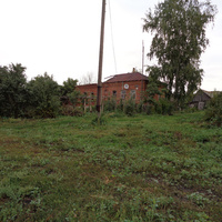 Деревня Дербень, дом Царёвых с очень красивой кирпичной кладкой и с великолепным фасадом