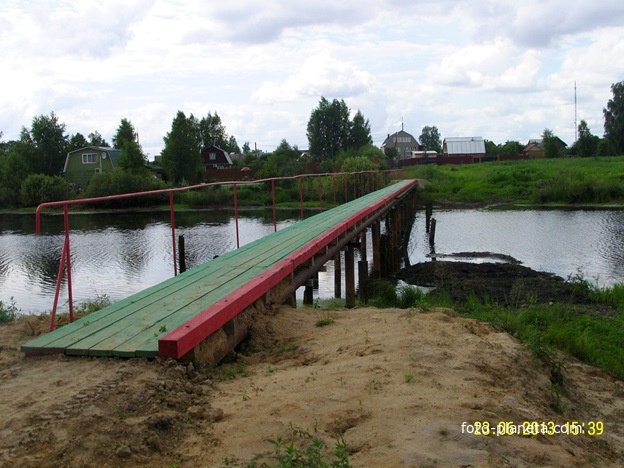 Новый мост через реку Поля в деревне Воронинская