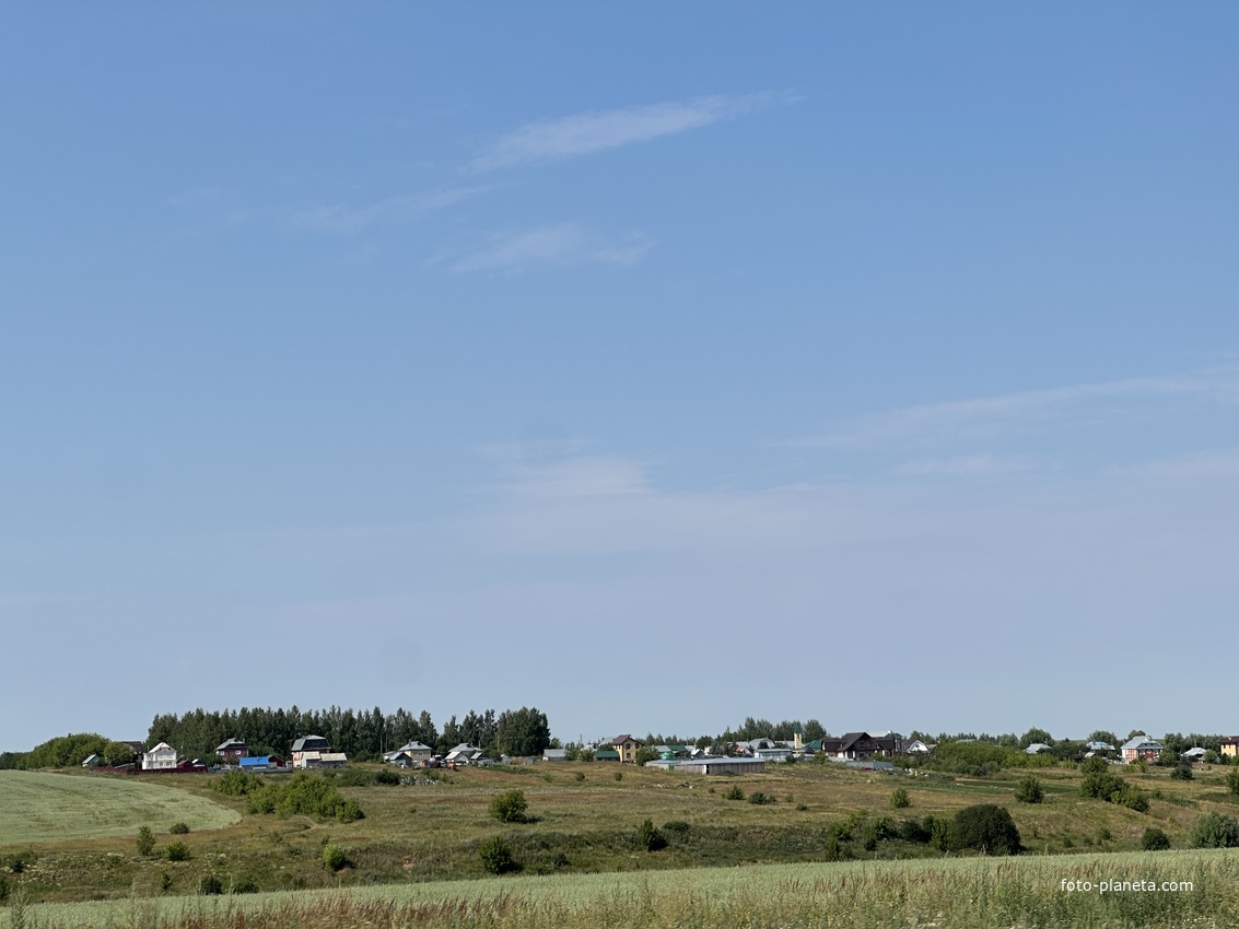 Вид на село со стороны дороги