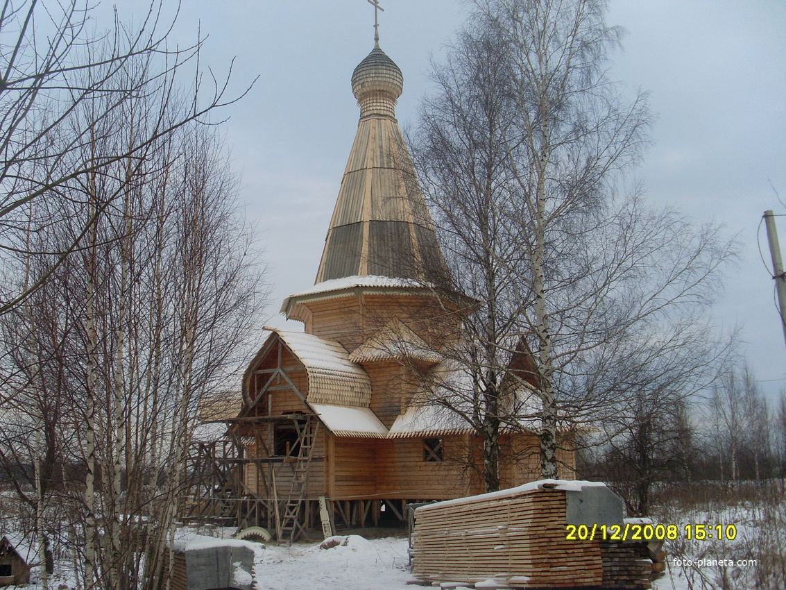 деревянная церковь в Плуткове