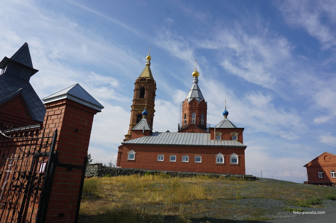 На территории Преображенской Церкви.